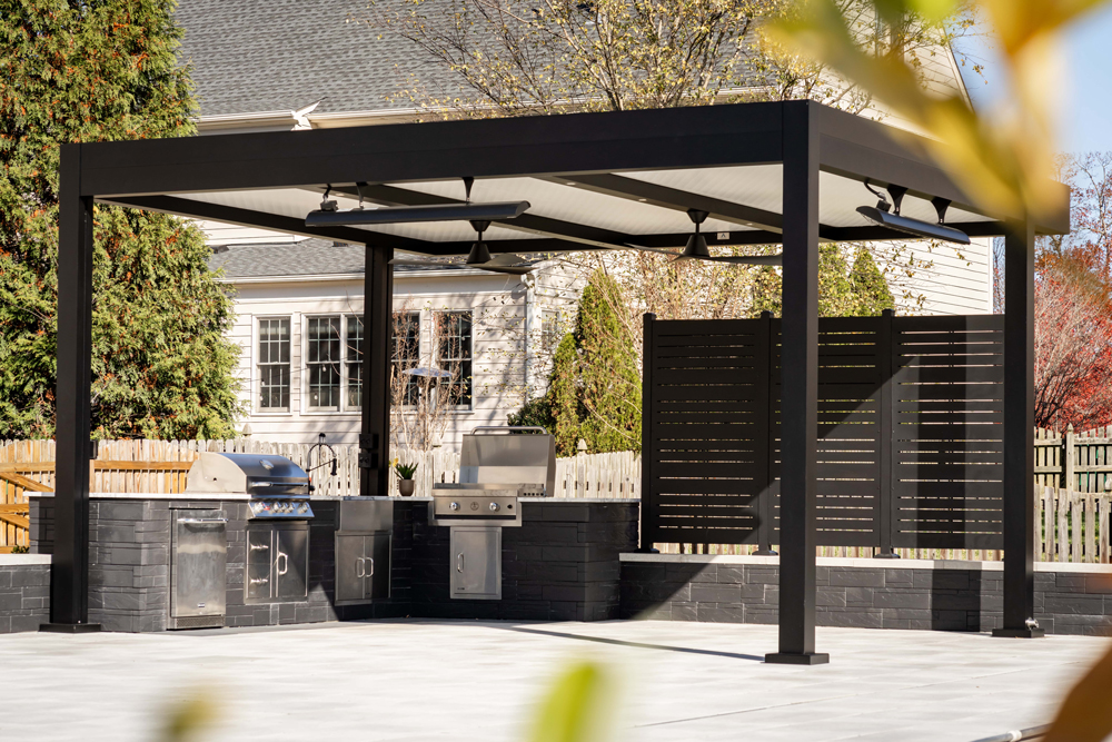 Rain-Ready Pergola Designs for Seattle’s Wet Season VA vb patios black r shade white roof fans heaters recessed lights outdoor kitchen 2 min